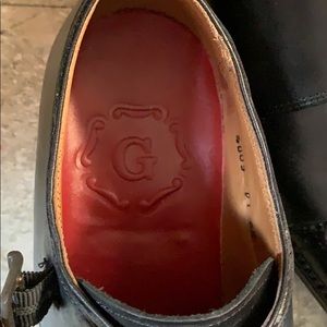 Black leather Monk loafers